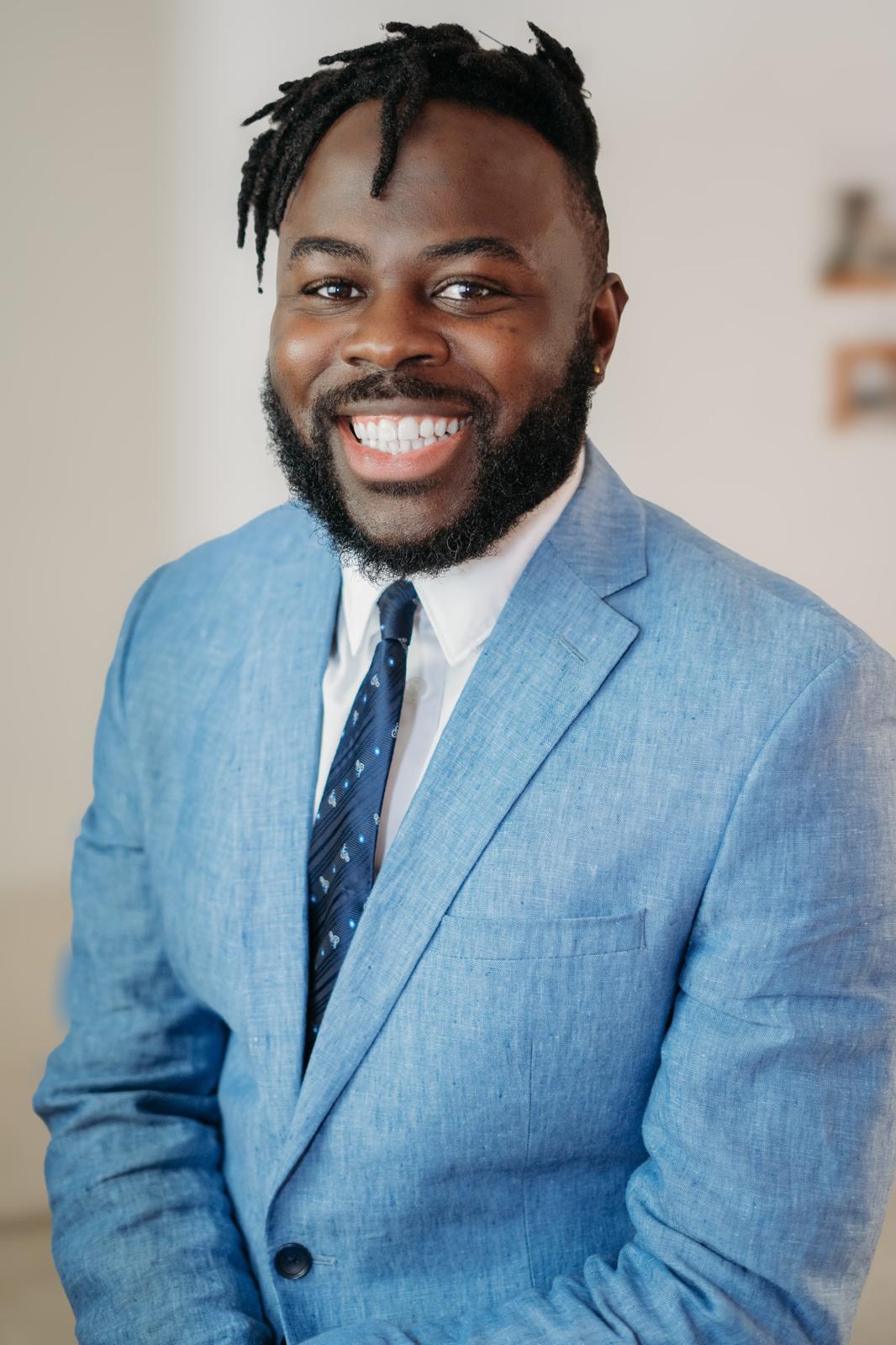 Dr. Belle Taku