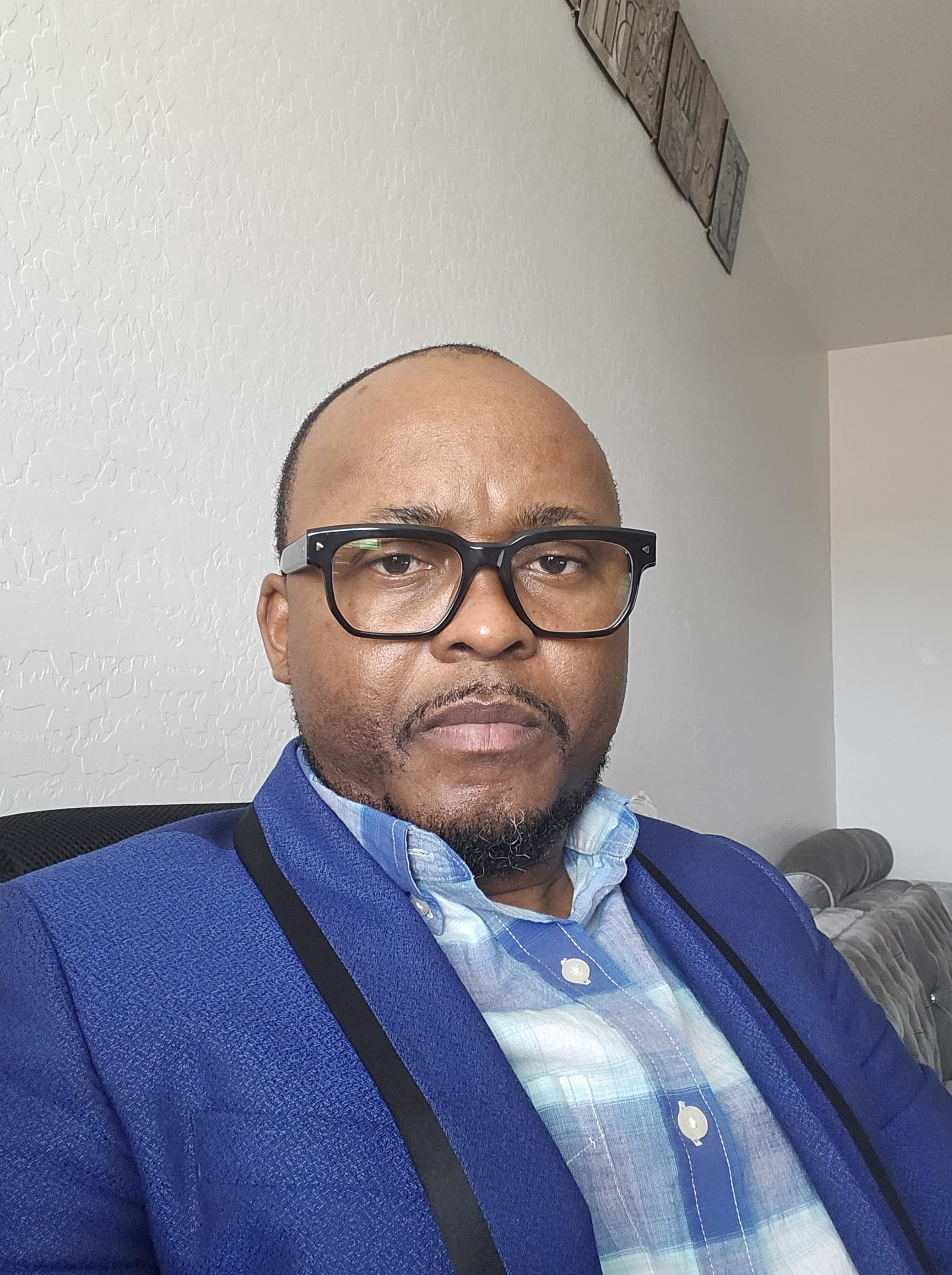 Mr. Wilson Elangwe